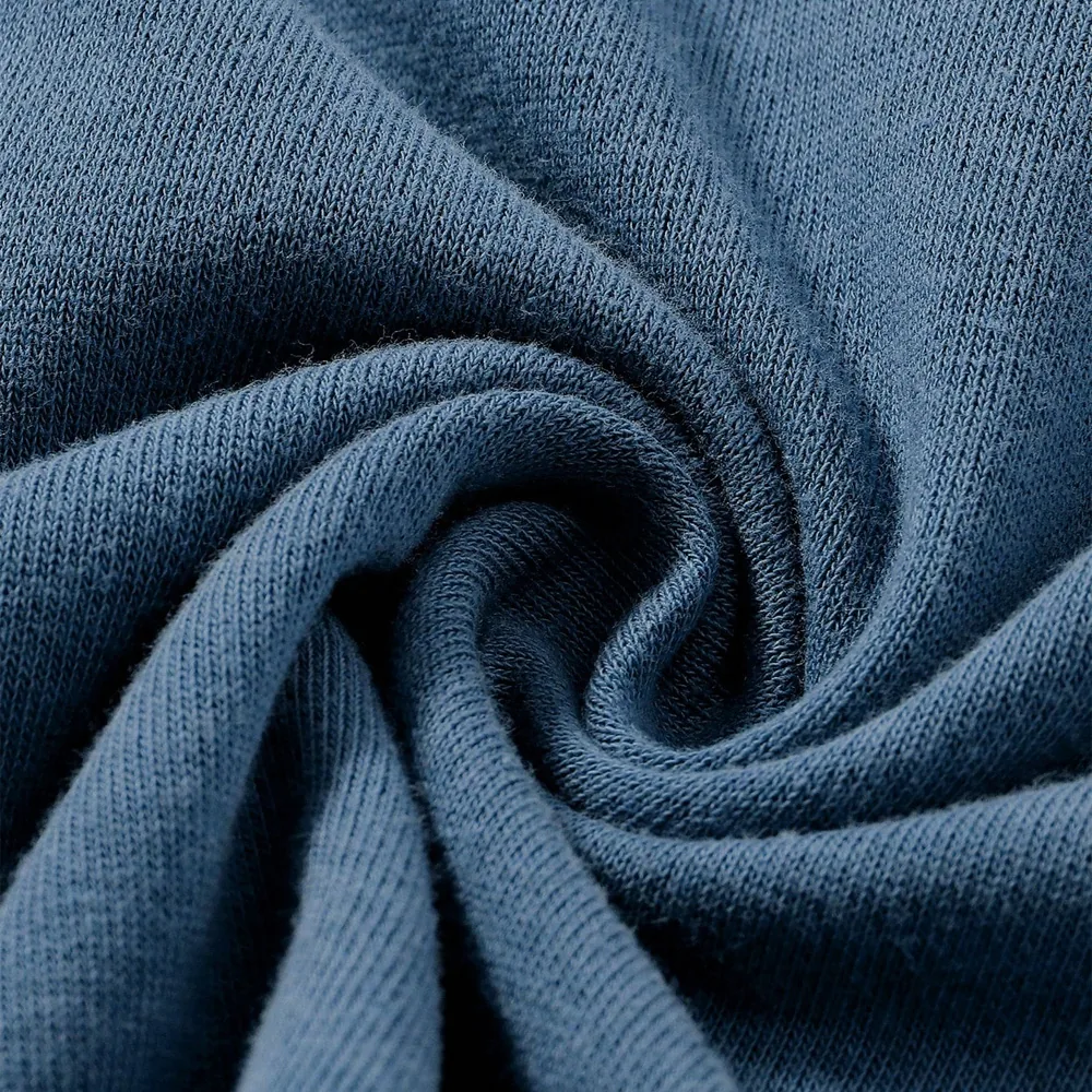 Close-up of knitted cotton jersey showing surface and hand